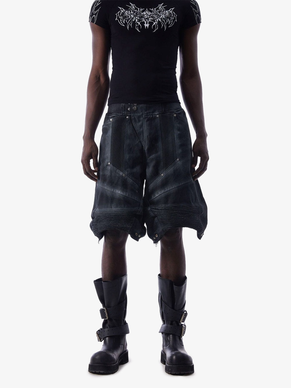 Angled front view of layered denim shorts in washed blue denim