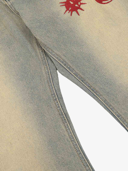 Back view of distressed wide-leg jeans in blue denim