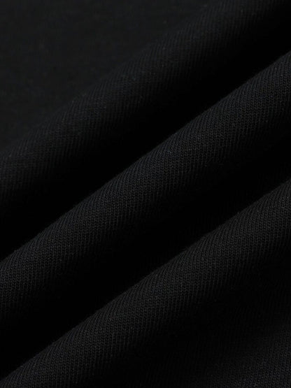 Black cropped cotton T-shirt styled on model from back