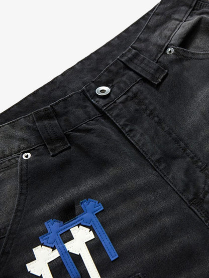 Detail view of the waistband and pockets on wide-leg denim jeans