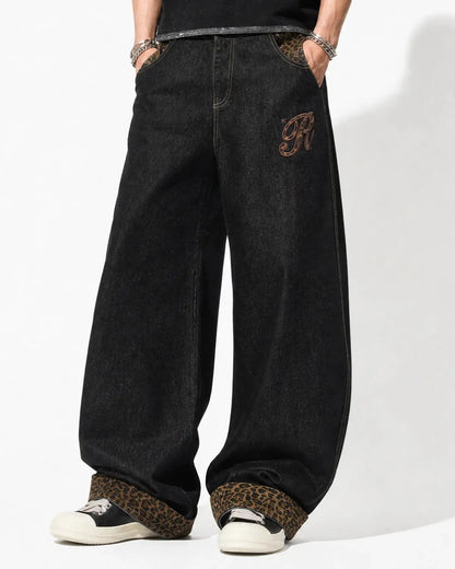 Front view of leopard patchwork embroidered baggy jeans