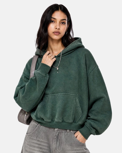 Relaxed streetwear hoodie showing its long sleeves