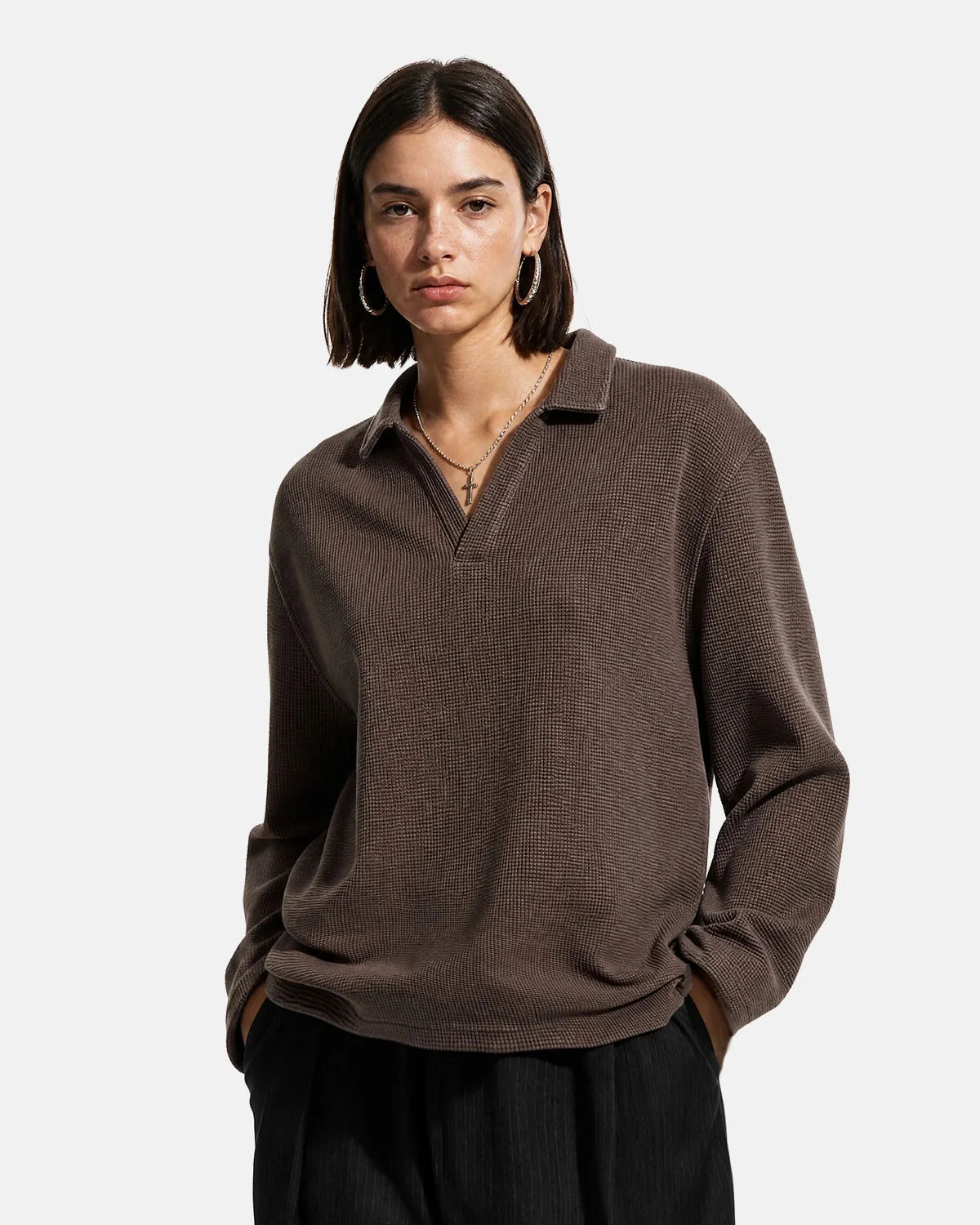 Casual washed waffle polo shirt displayed from the front