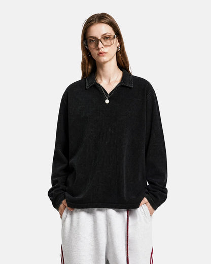 Washed polo shirt showing its relaxed boxy silhouette