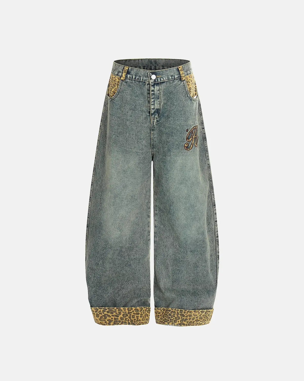 Side view showing the relaxed silhouette of patchwork jeans