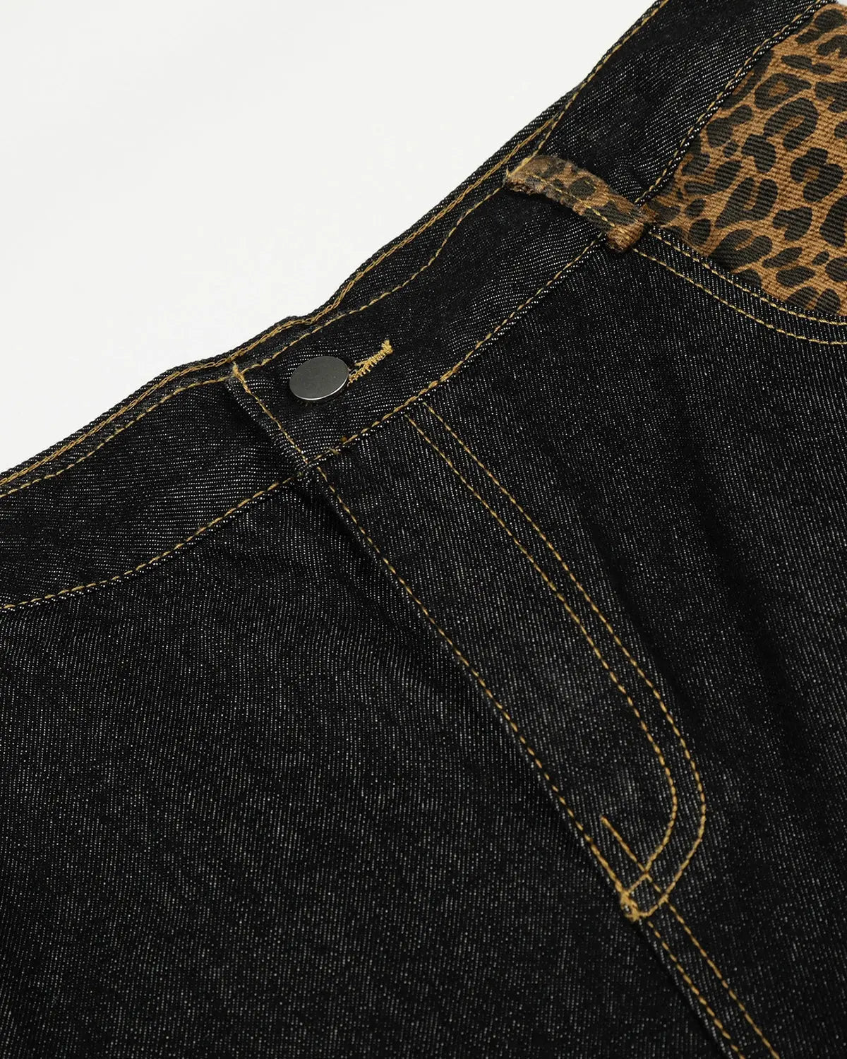 Leopard patchwork denim jeans styled for a casual streetwear look