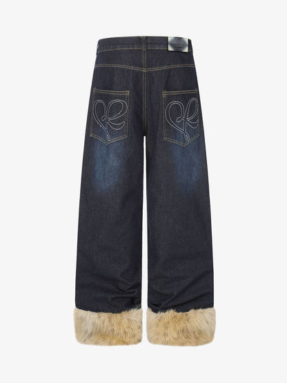 Faux fur cuffs shown on the hems of the jeans