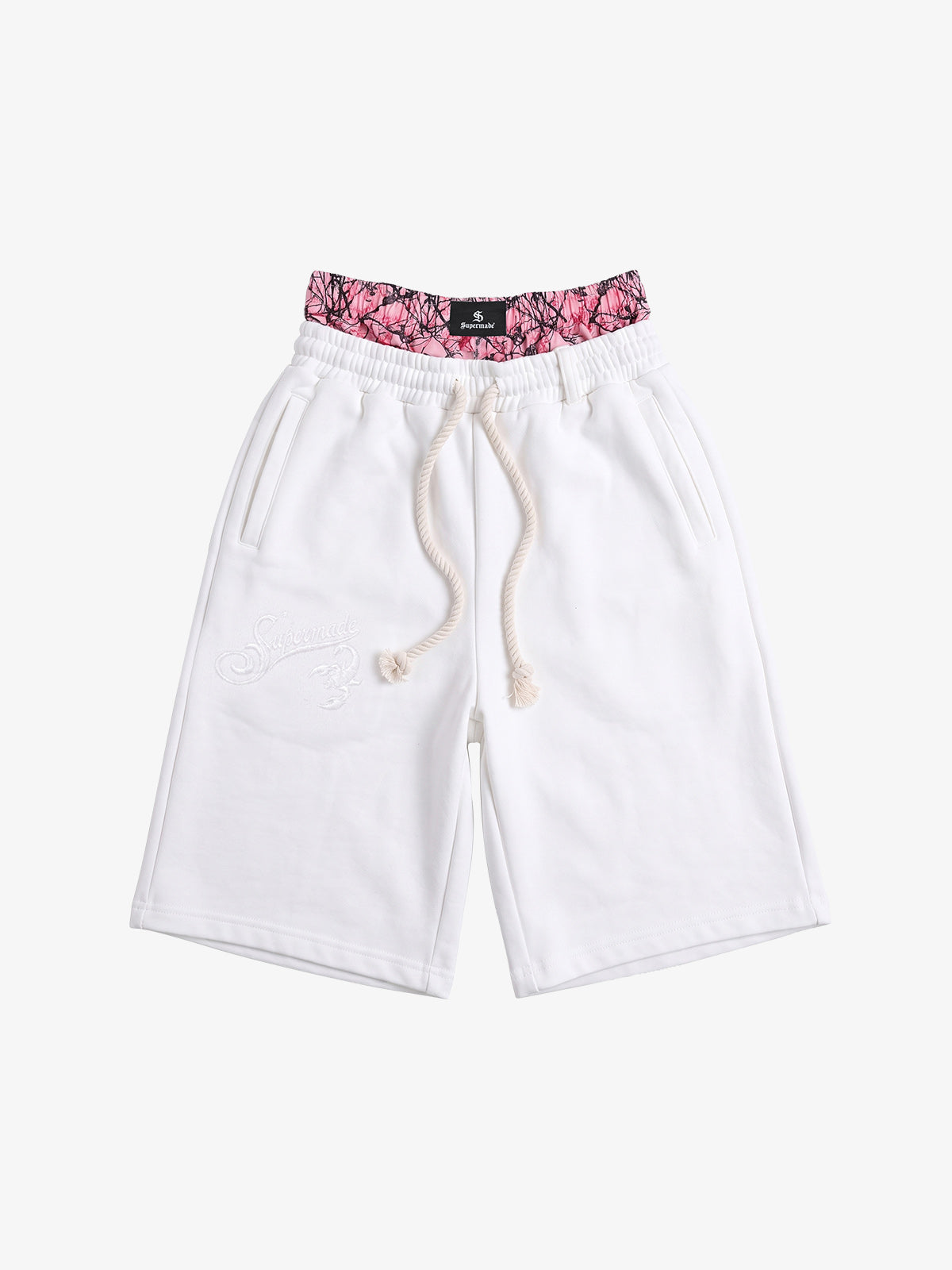 Close-up of logo embroidery on double waist jogger shorts