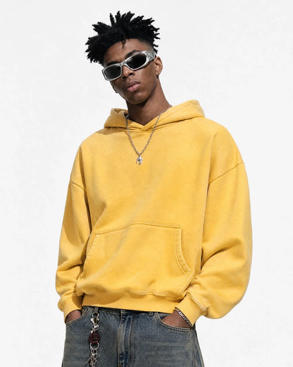 Washed fleece hoodie showing its relaxed boxy silhouette