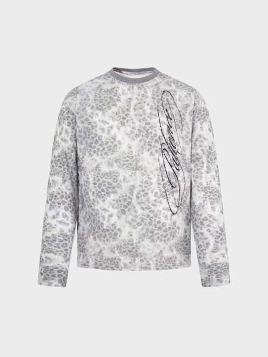 Distressed leopard print long-sleeve top shown from the front