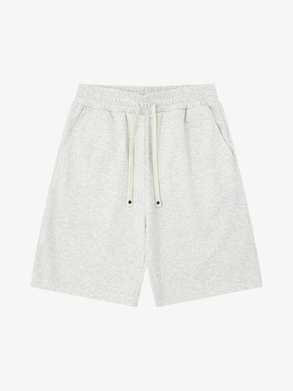 Side view of men's graphic sweat shorts with relaxed fit