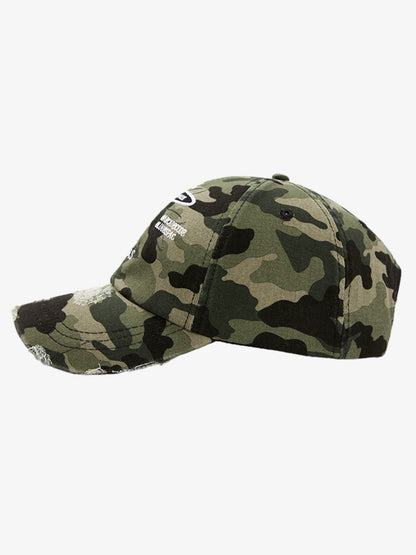 Embroidered distressed baseball cap styled from three-quarter angle