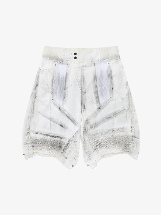Front view of layered denim shorts with mesh panels and double waist detail