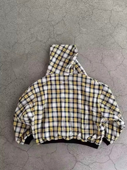 Hood detail on a checkered zip-up hoodie