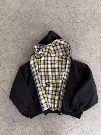 Zip fastening detail on a checkered hooded hoodie