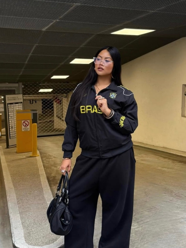 Football track jacket with embroidered number 9 styled for casual wear