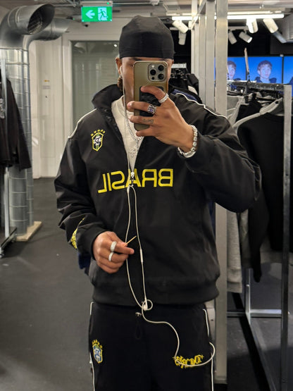 Close-up of the embroidered number 9 on a football track jacket