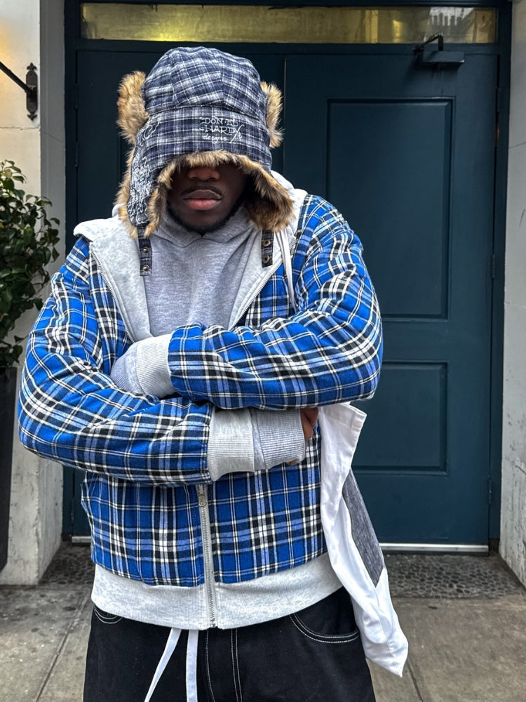 Full view of a checkered zip-up hoodie with hood