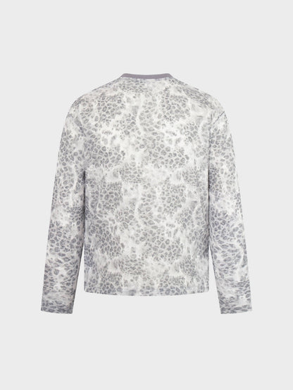 Close-up of the distressed leopard print fabric on the top