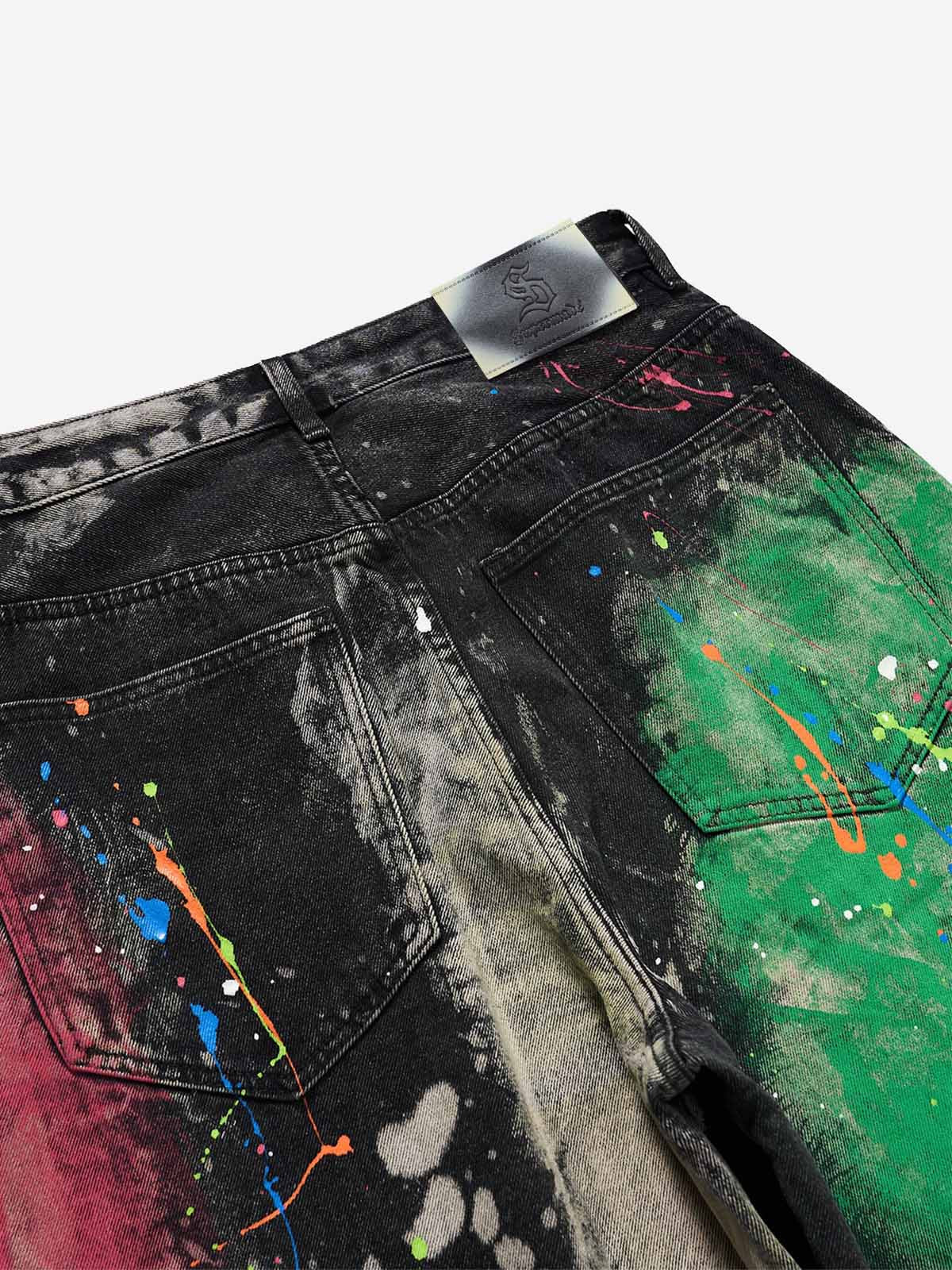 Paint-splatter jeans styled for a bold everyday outfit