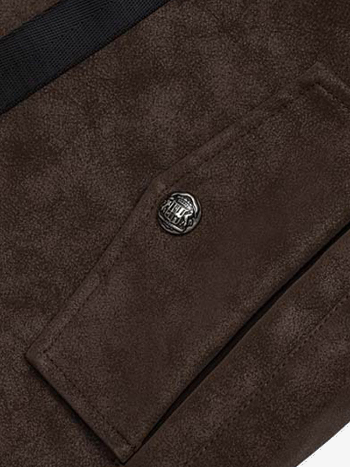 Back view of the brown cropped patchwork jacket in faux leather