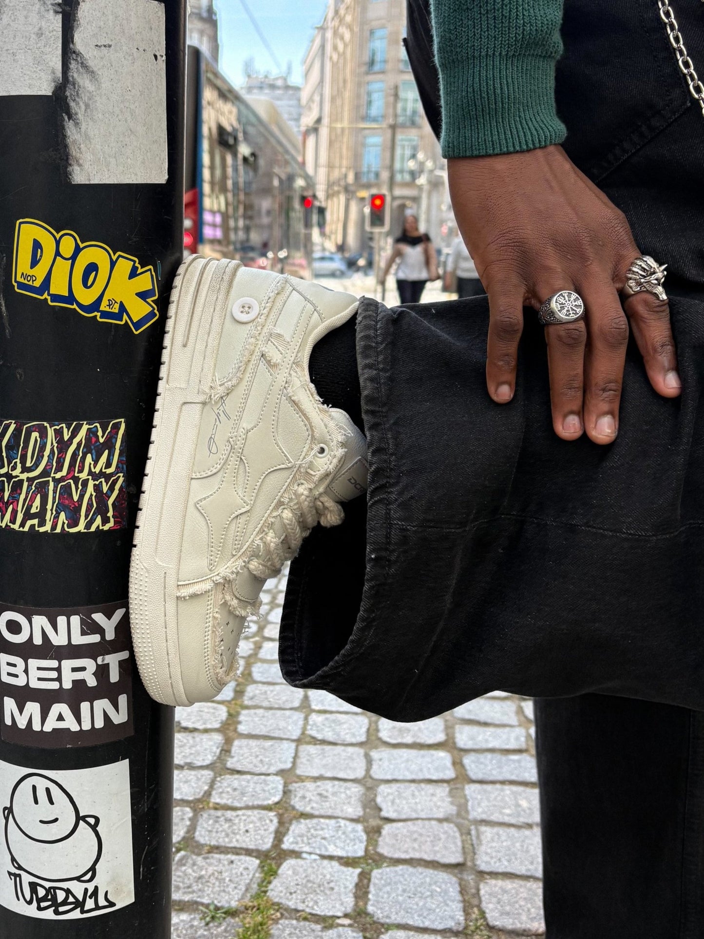 Full view of cream sneakers for everyday streetwear