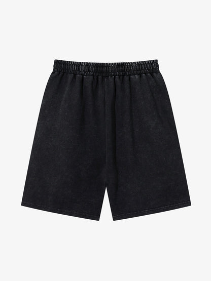 Close-up of distressed women's shorts with thorn-inspired rhinestone embellishment