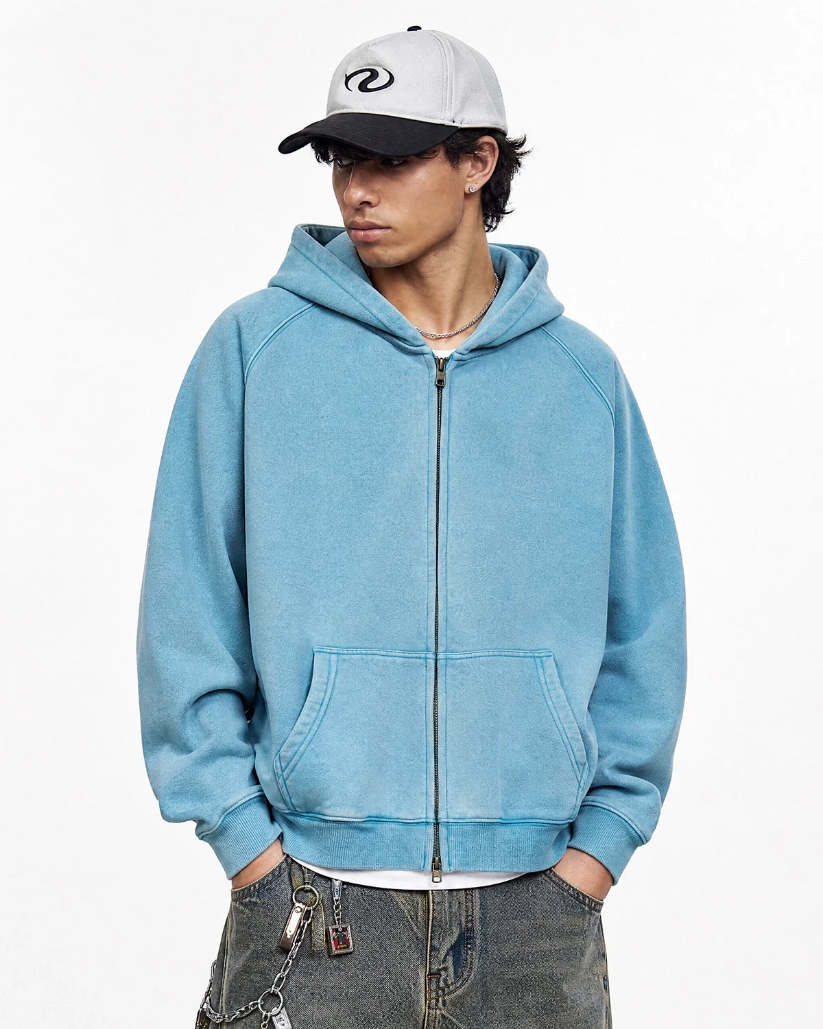 Detail of the hoodie drawstrings and soft hood opening