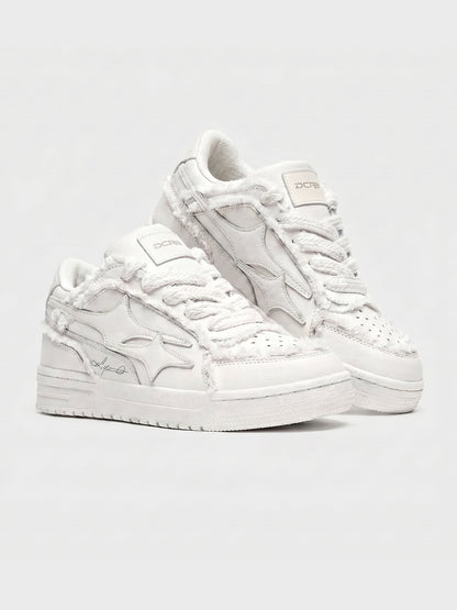Cream sneakers shown from the back