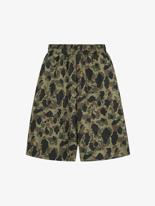 Side view of women's loose-fit camo cargo shorts in cotton blend
