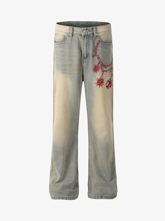 Distressed wide-leg jeans with red embroidered detail on the front