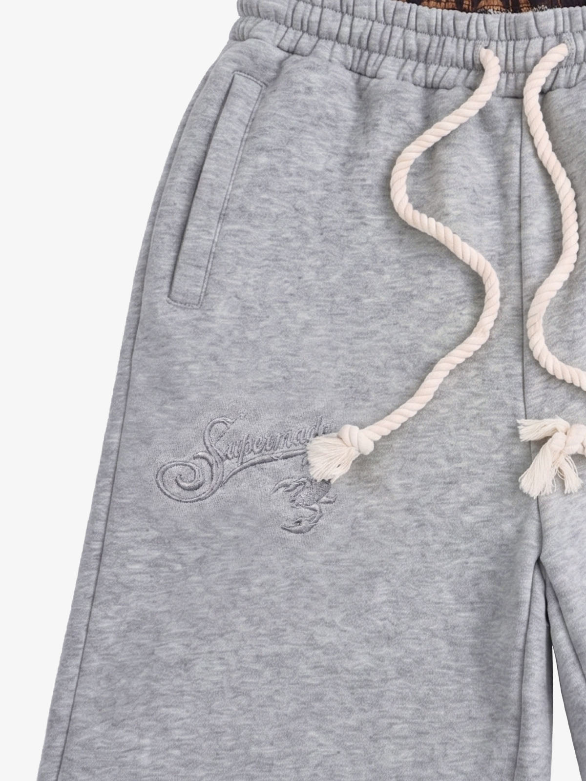 Fabric close-up of soft heathered cotton-blend jogger shorts