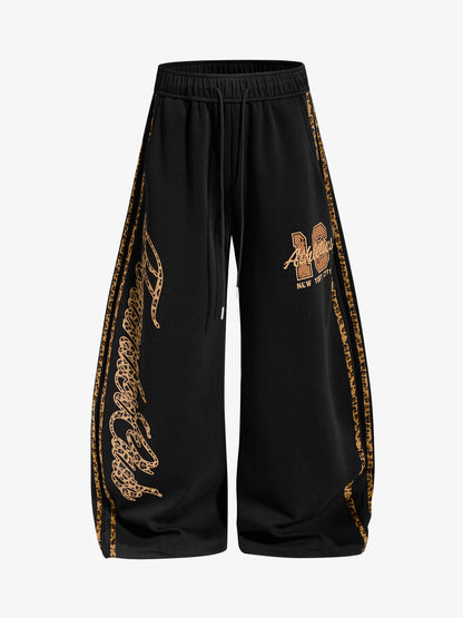 Close-up of the graphic patchwork detail on the sweatpants
