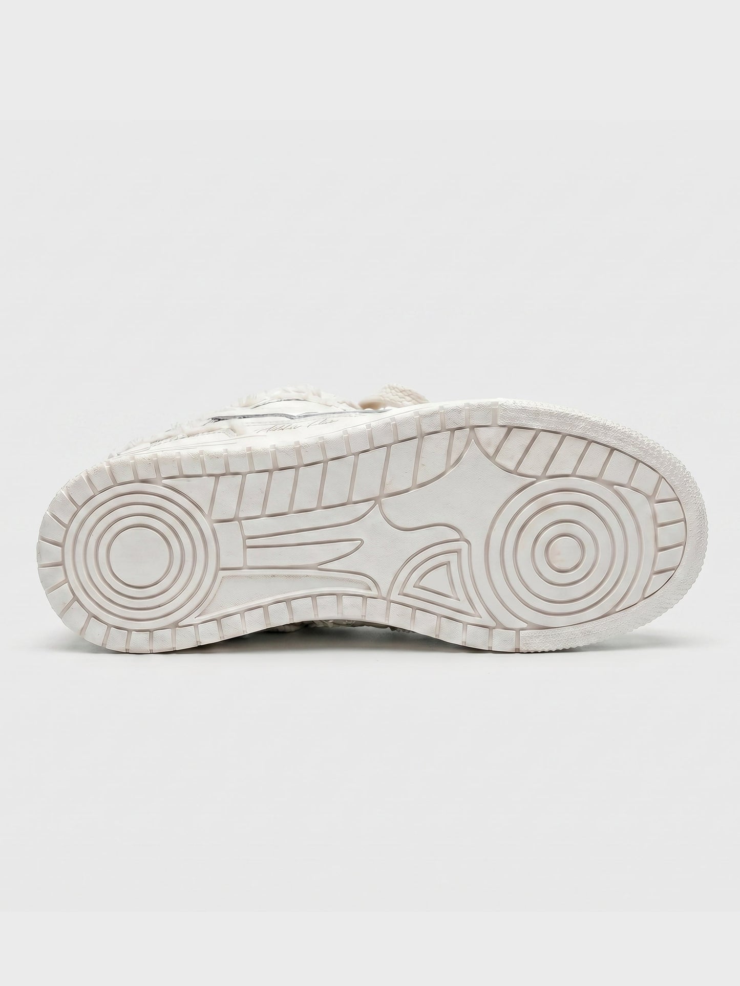 Close-up of the cream sneaker upper and laces