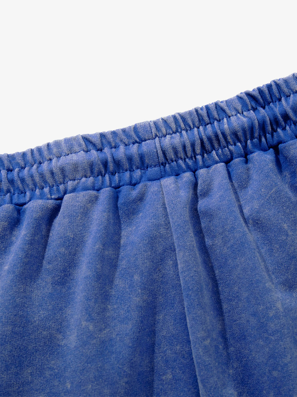 Full view of washed sweat shorts showing casual comfortable fit