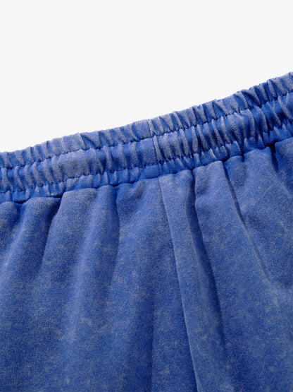Full view of washed sweat shorts showing casual comfortable fit