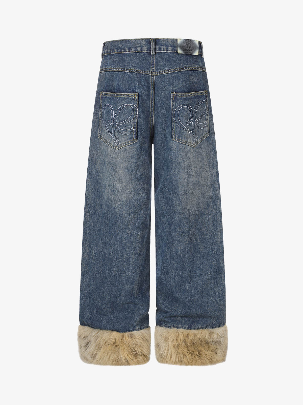 Wide-leg jeans featuring studded detailing along the legs