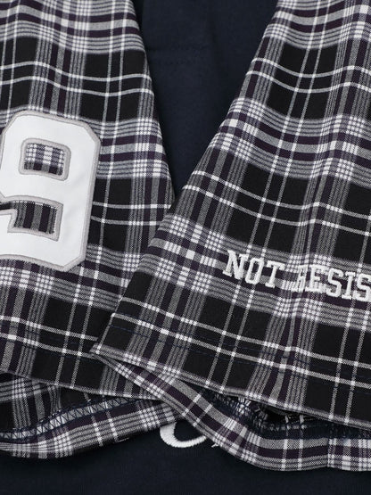 Cotton fabric texture on the plaid sleeve polo shirt