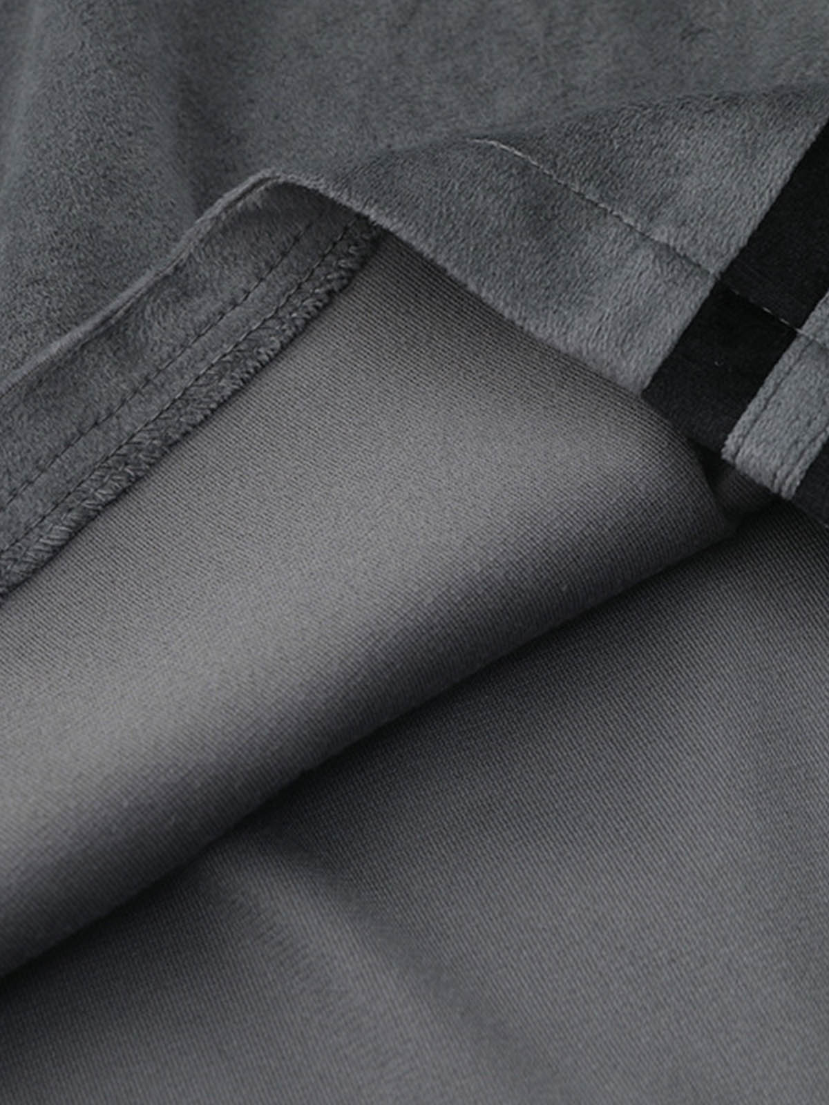 Full-length view of model in suede athletic shorts
