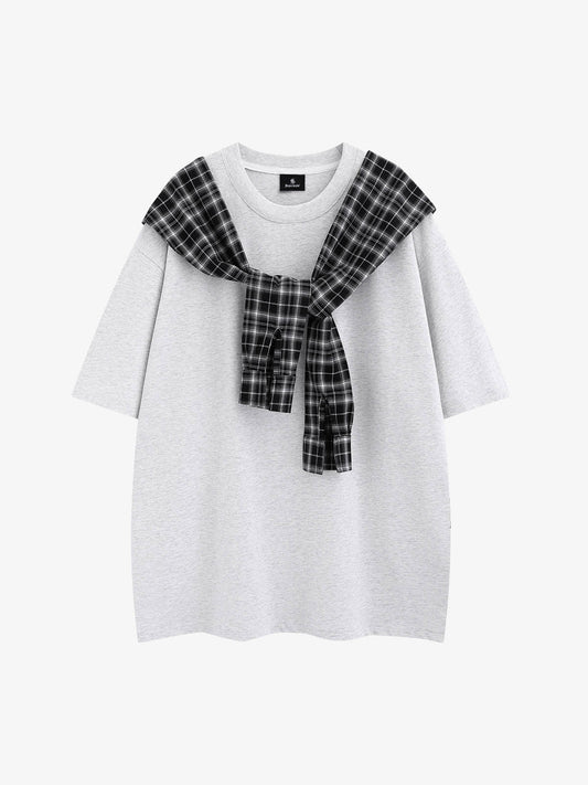 Front view of oversized patchwork plaid T-shirt in casual streetwear style