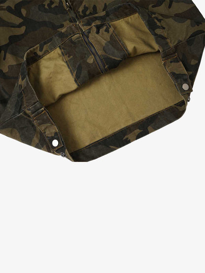 Detail of the button fastening and chest pocket on the denim work jacket