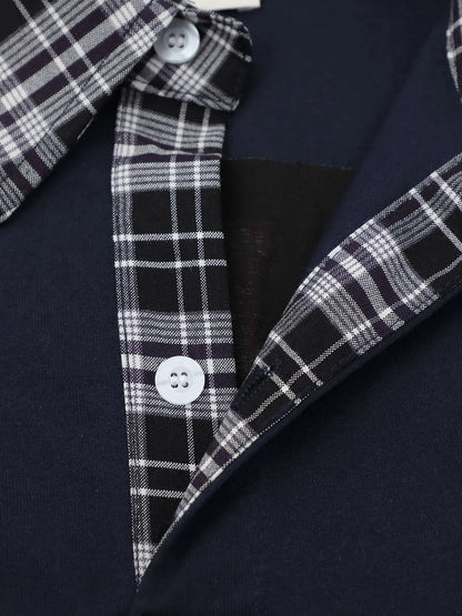 Polo shirt cuffs and plaid sleeve detail