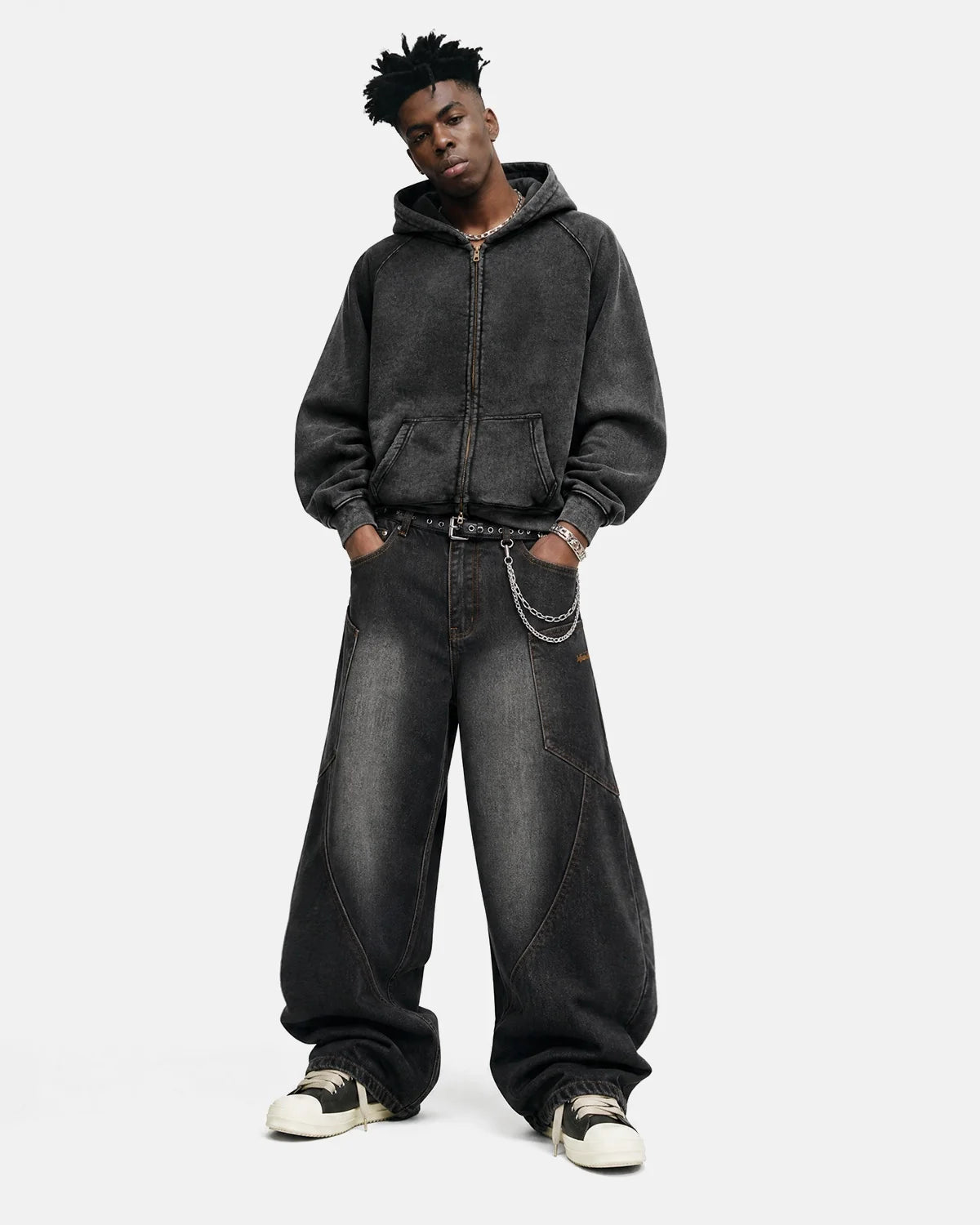 Side view showing the relaxed shape of a washed raglan sleeve hoodie