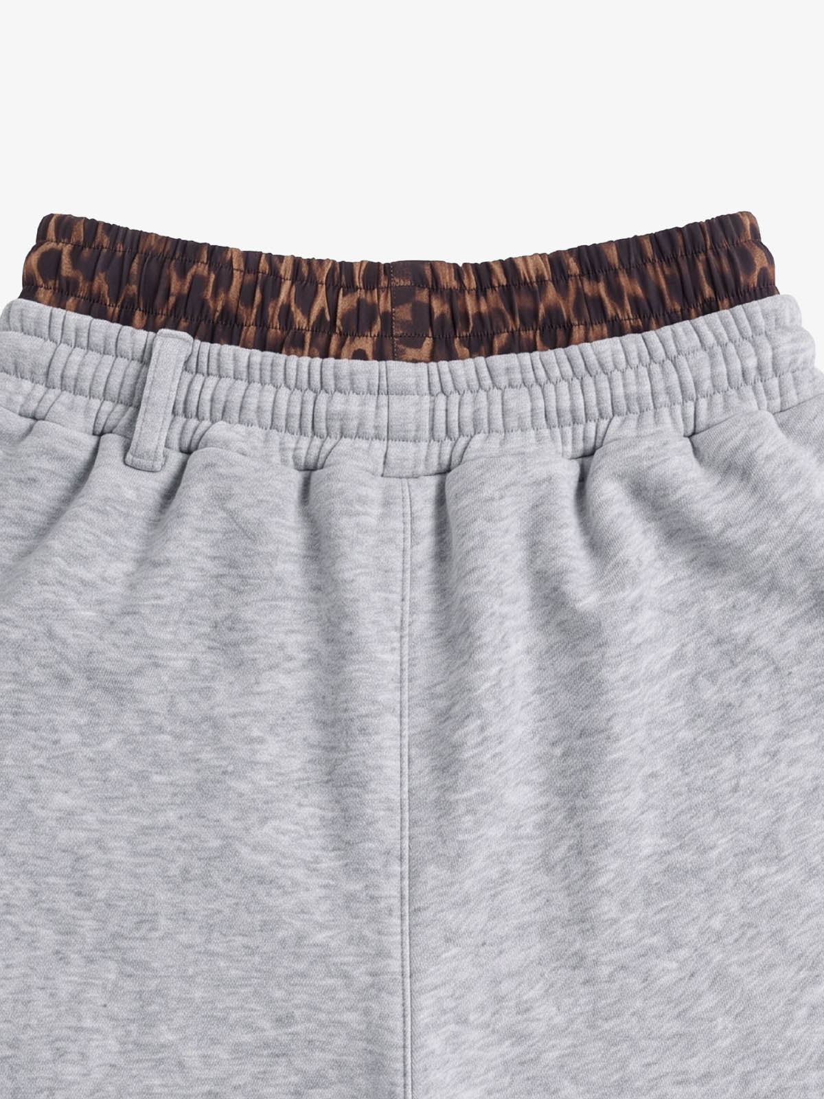 Full-length laid-flat view of heathered cotton-blend jogger shorts