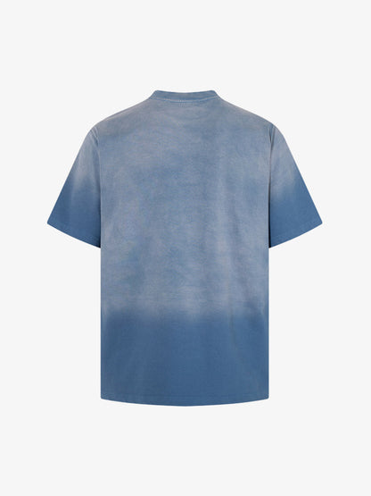 Angled front view of relaxed fit graphic cotton T-shirt