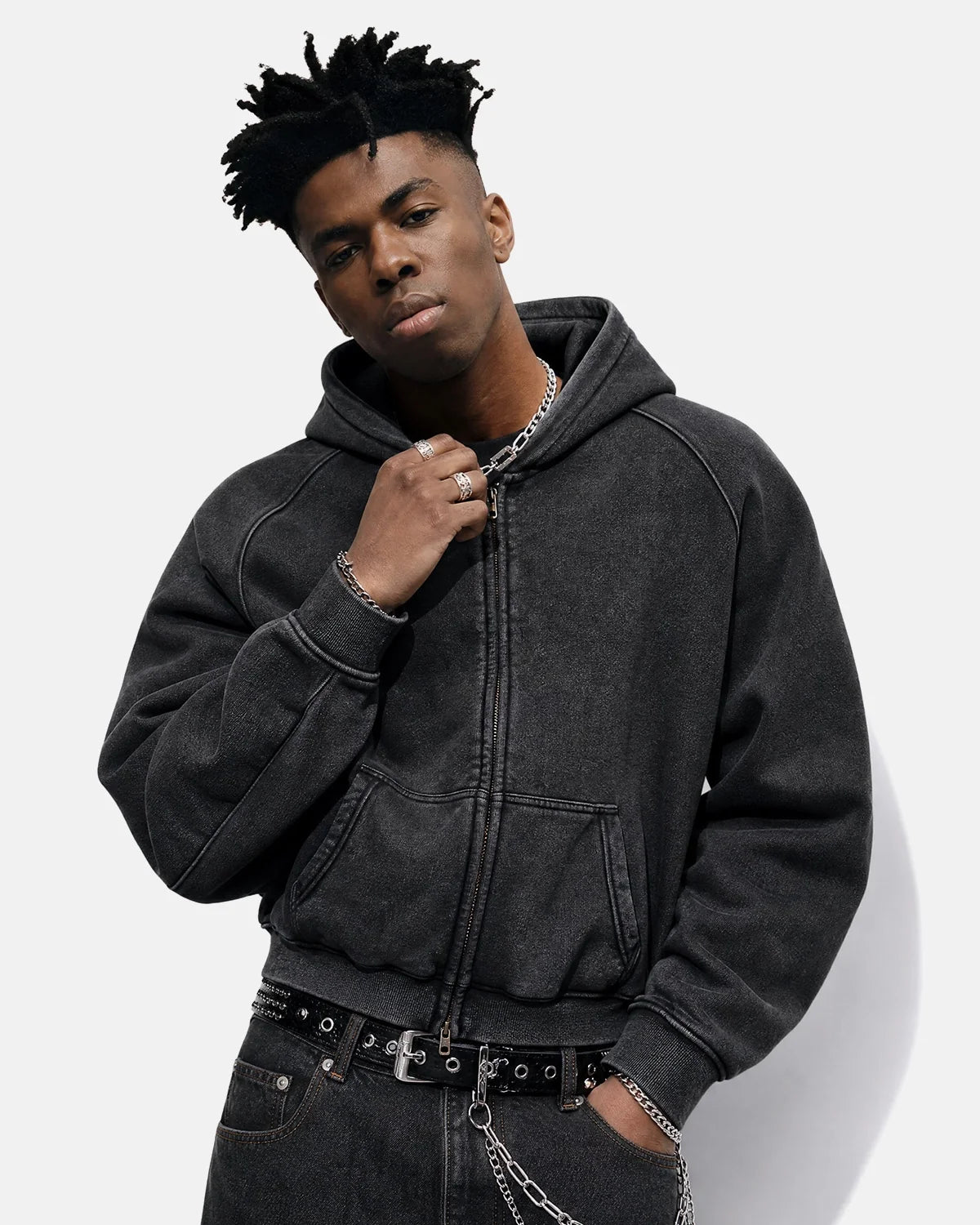 Full-length view of a model wearing a washed raglan sleeve hoodie