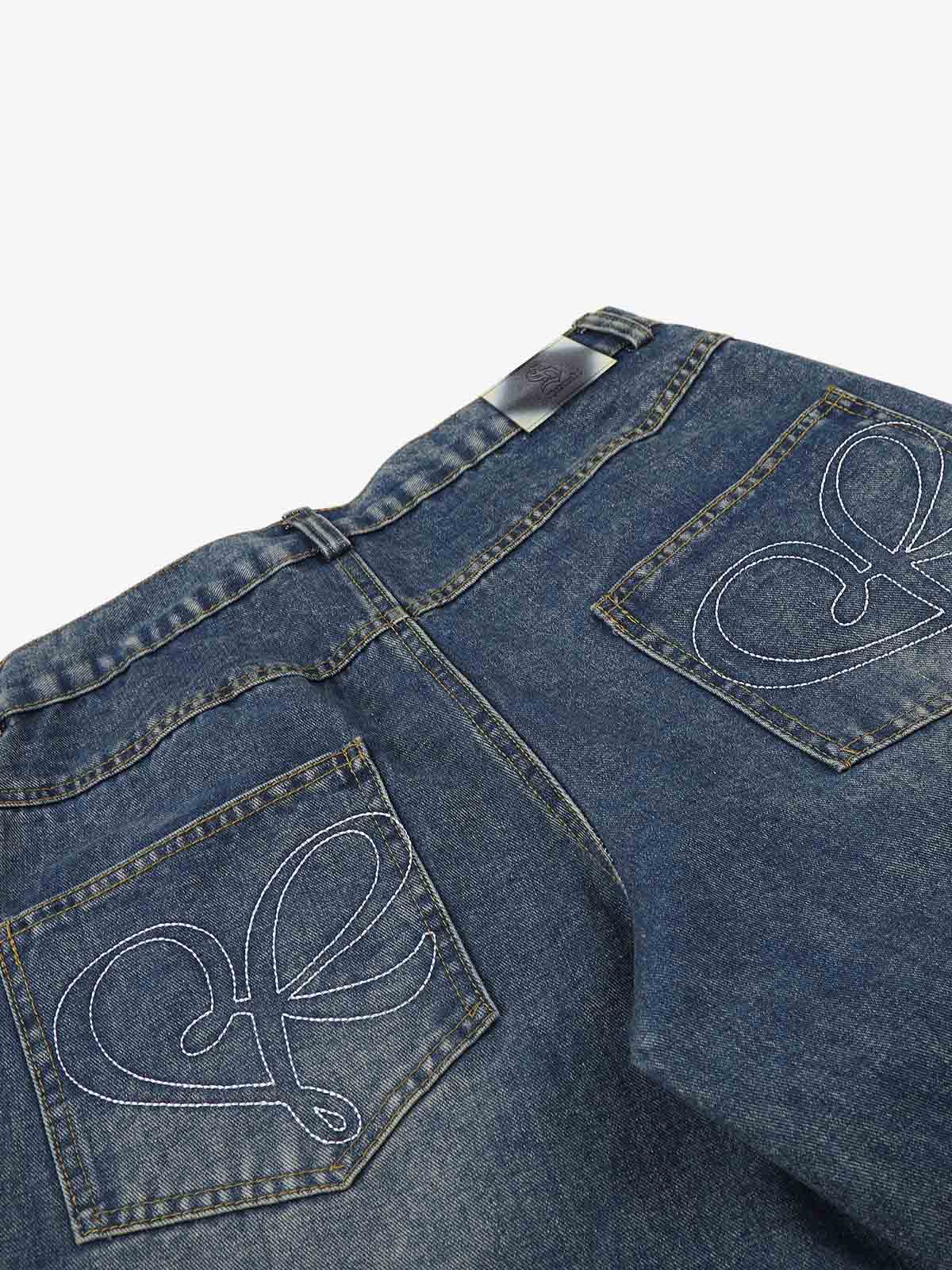 Back view of wide-leg jeans with decorative studded detail