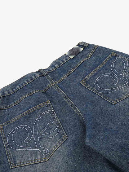 Back view of wide-leg jeans with decorative studded detail