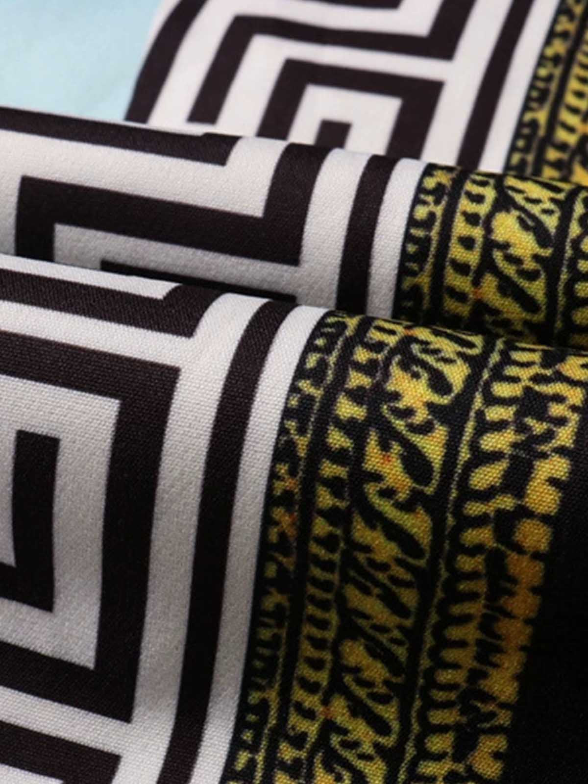 Folded cotton linen scarf with patterned baroque patchwork design in a lightweight woven fabric