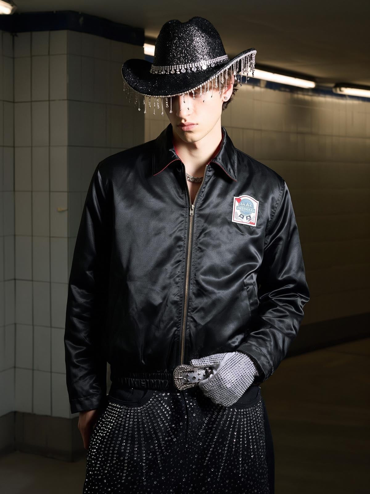Side view of the varsity jacket showing its structured silhouette